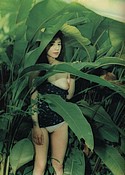 Yumiko Itaya strips nude behind tree