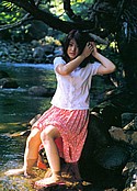 Summer dress clad Minami Yoshikawa by stream