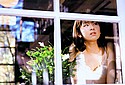 Minori Aoi gazes thither out of a window