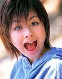 Close up of visibly excited Minori Aoi